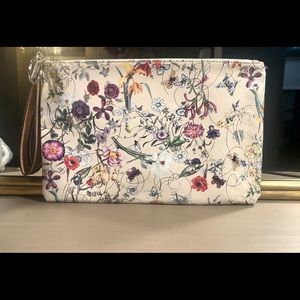 Floral clutch by Carlos Santana